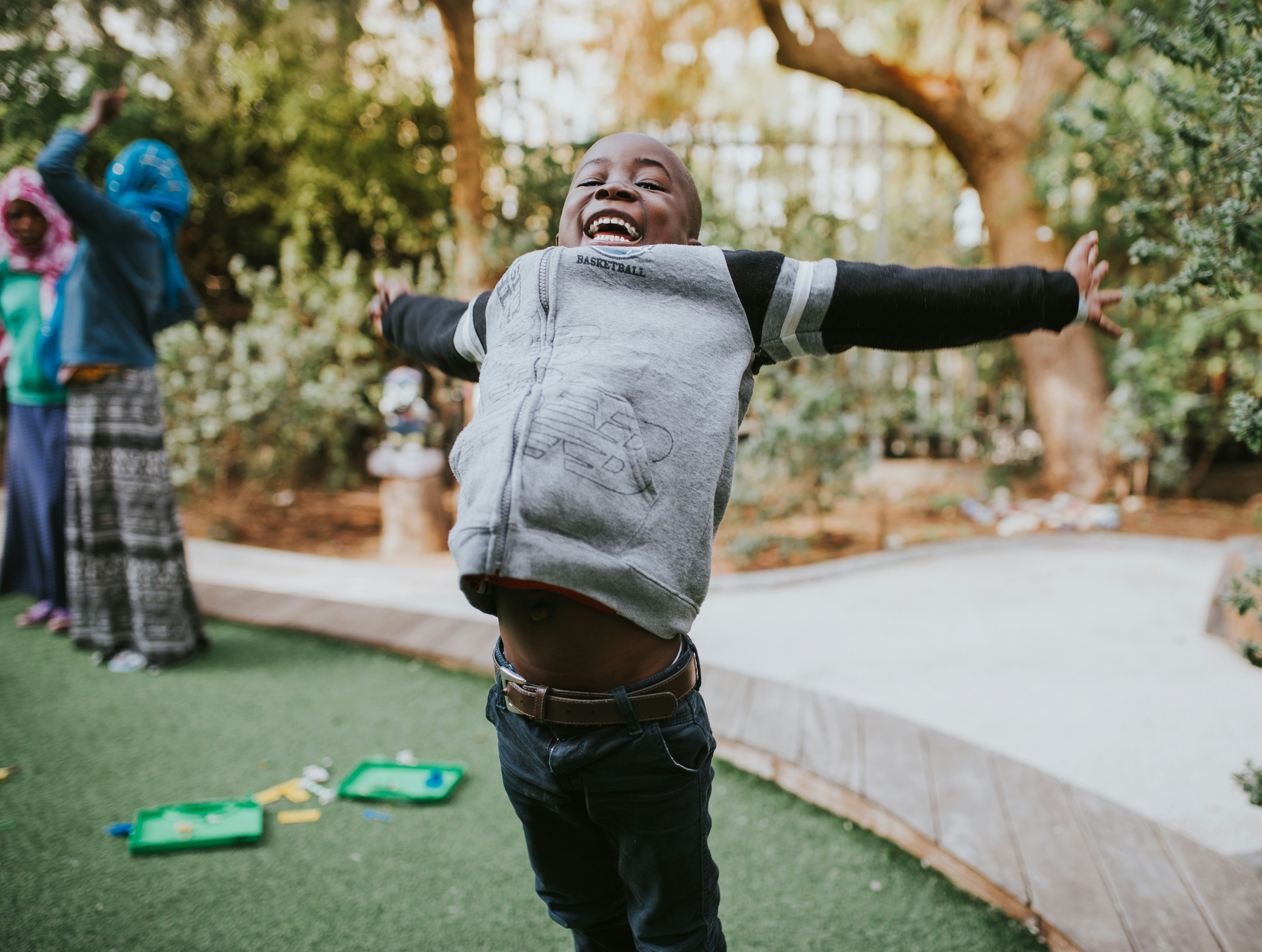 Excited Black child celebrating achievement