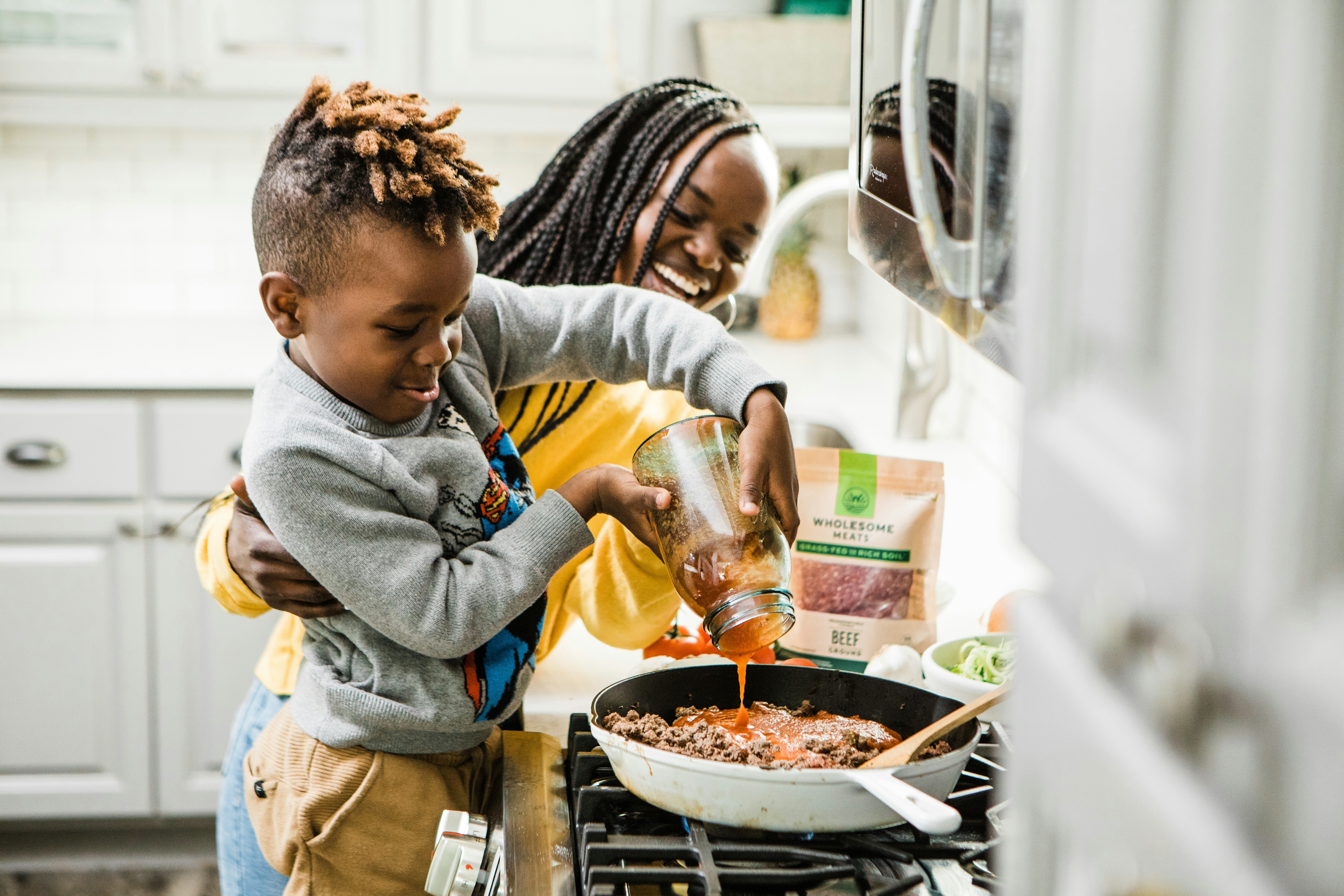 Black children using Tija Kids app together