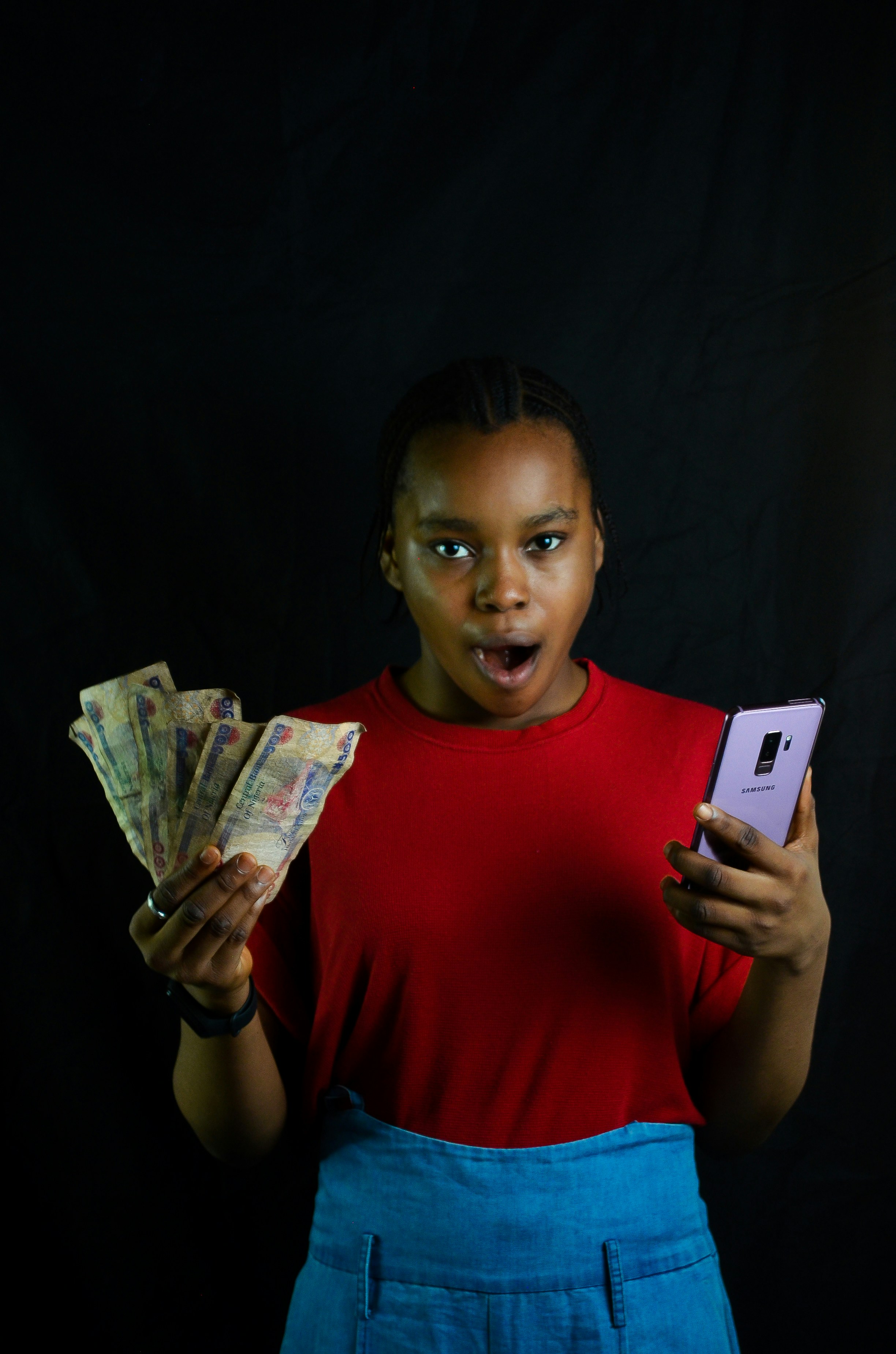 Black child learning math and budgeting skills